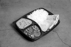 Mini Veg Thali (chole + Daal Fry + 2 Chapati + Rice)