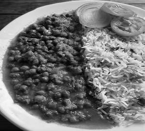 Basmati Rice With Aloo Channa Masala & 1 Nos. Roasted Papad.