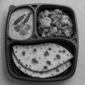 Tandoori Roti (2pc) + Veg of the day + Dal Fry