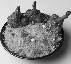 Chicken Drumstick Schezwan Fried Rice