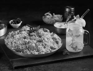 Half KG Veg Mughal Biryani + Lemonade + Raita