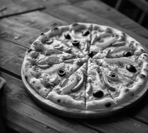 Cheese baby corn pizza