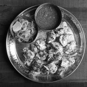 Half Afghani Chicken + Half Malai Tikka + 2 Roomali