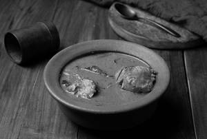 Man Satti Meen Kozhambu