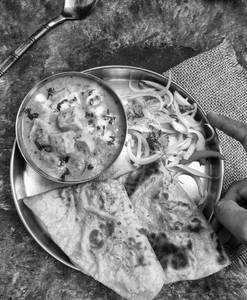 Paneer Butter Masala with 2 Butter Roti