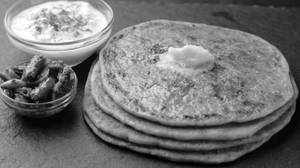 2 Plain Tawa Parantha With Dahi And Butter