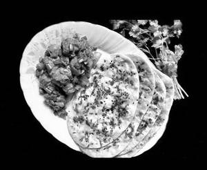 Veg Manchurian(4Pc.) With Garlic Naan(2Pc.)