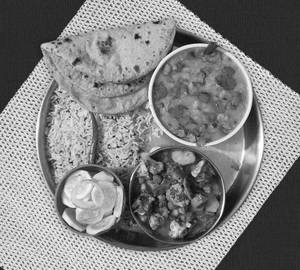 4 Tawa Roti+ Dal Fry+Jeera Rice+ Aloo Ghobhi