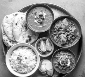 Dal Makhani + Aloo Ki Sabzi + Chholay + Rice + 2 Naan