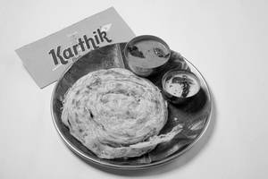 Ring Parotta (2 Nos.) With Kurma