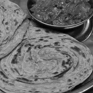 Set Wheat Porotta - Two Nos & Curry