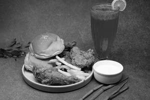 2 Pc Broasted Chicken + 1 Bun + French Fries + Mayo + Grape Juice