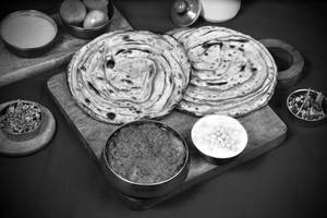 Joghan Rosh Chaap Masala [300ML]+Boondi Raita[125ML]+Choice Of Breads