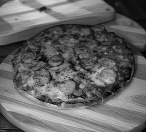 Barbeque chicken sausage pizza