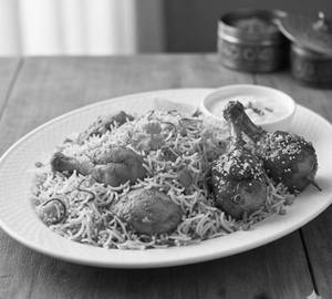 Chicken biriyani half with 2 pcs lolipop