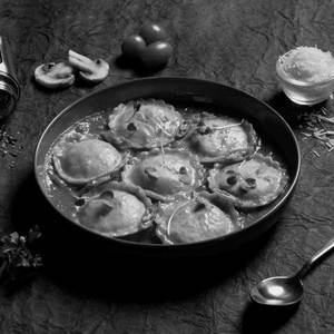 Ravioli In Spicy Tomato Sauce