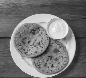 Aloo Pyaaz Paratha With Curd