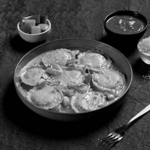 Ravioli In Creamy Tomato Sauce