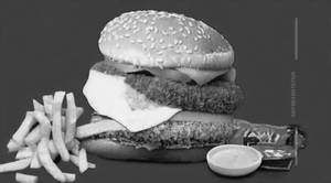 Schezwan Cheese Delight Burger
