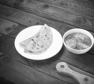 Ghee Parota 2 Pcs With Aloo Dum, Boiled Egg  And Sweet