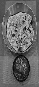 Chicken Manchurian Gravy (4pcs) + Tandoor Rooti With Butter (2pcs)