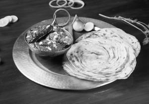 Saagwala Kukkad With Lachha Paratha