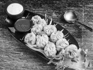 Paneer Afghani Gravy Momos 8pc