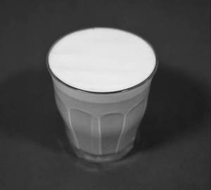 Flat white (a blend of micro foam poured over with doubleshot of espresso]
