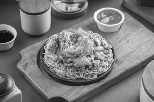 Sizzling Schezwan Vegetable Pan Fried Noodles