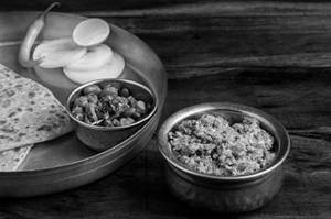 .Paneer Bhurji and Sada Paratha Thali.
