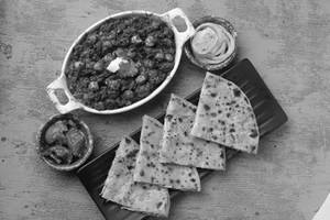 2 Stuffed Paratha With Chole And Raita