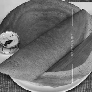 Egg Schezwan Spring Dosa