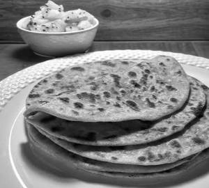 Parota 2 Pcs  With Sada Aloo Tarkari, Boiled Egg And Sweet