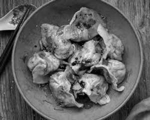 Vegetable Dumplings in Manchurian Sauce 