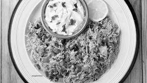 Paneer Tikka Biryani With Raita