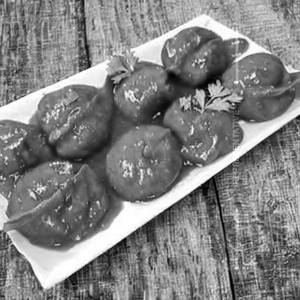 Veg Tawa Gravy Momos