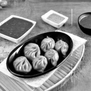 Cheese & Corn Rogan Josh Gravy Momos