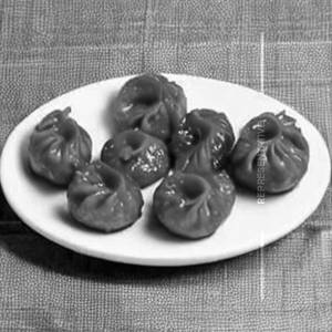 Paneer Tawa Gravy Momos