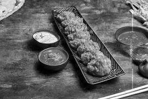 Chicken Achari Masala Momos