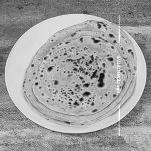 Trikon Paratha Aloodum