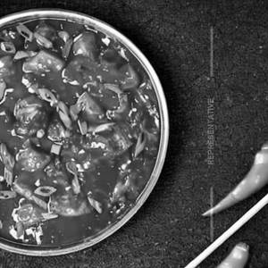 Potato In Manchurian Sauce Gravy