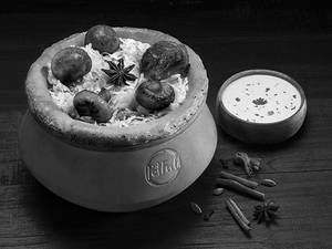 Claypot Hyderabadi Mushroom 65 Biryani