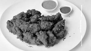 Chicken Schezwan Leg Fry