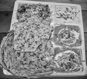 Full Tandoori Chap Masala + Full Dal Makhani + 2 Butter Nan + 2 Laccha Paratha + Green Salad
