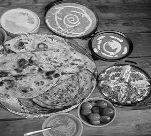 Full Dal Makhani + Half Shahi Paneer + 2Butter Nan + 2 Laccha Paratha.