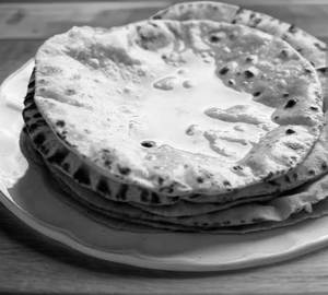 1 Nos. Wheat Tawa Roti ( Desi Ghee)