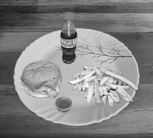 Mini Crispy Chicken Burger + Small French Fries +250 Ml Coke
