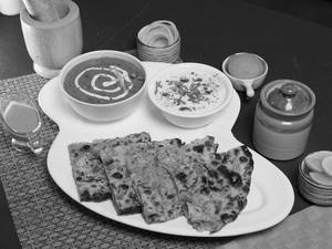 Dal Makhani + Raita + Stuff Kulcha (1 Pc)