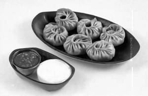 Veg fried momos -                                                                                         