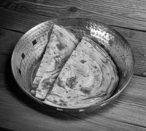 Kerala Paratha  (1pcs) with curd